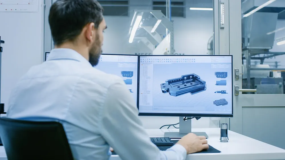 Engineer using CAD software to design an eclosure for a Printed Circuit