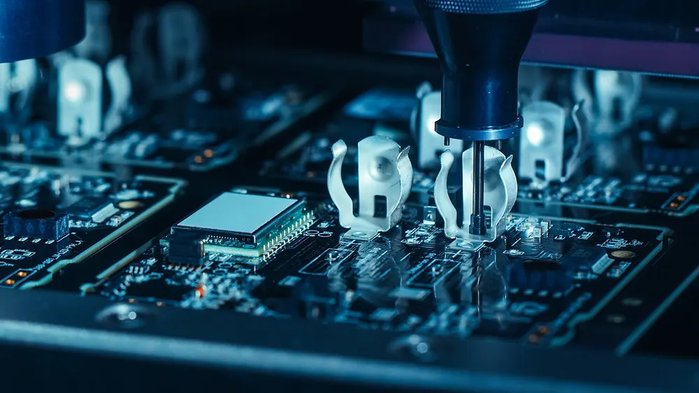 Electronic components being placed on a Printed Circuit by a Pick and Place machine
